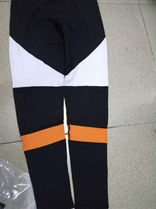 Pantalones de yoga de cintura alta ahuecados de malla negra